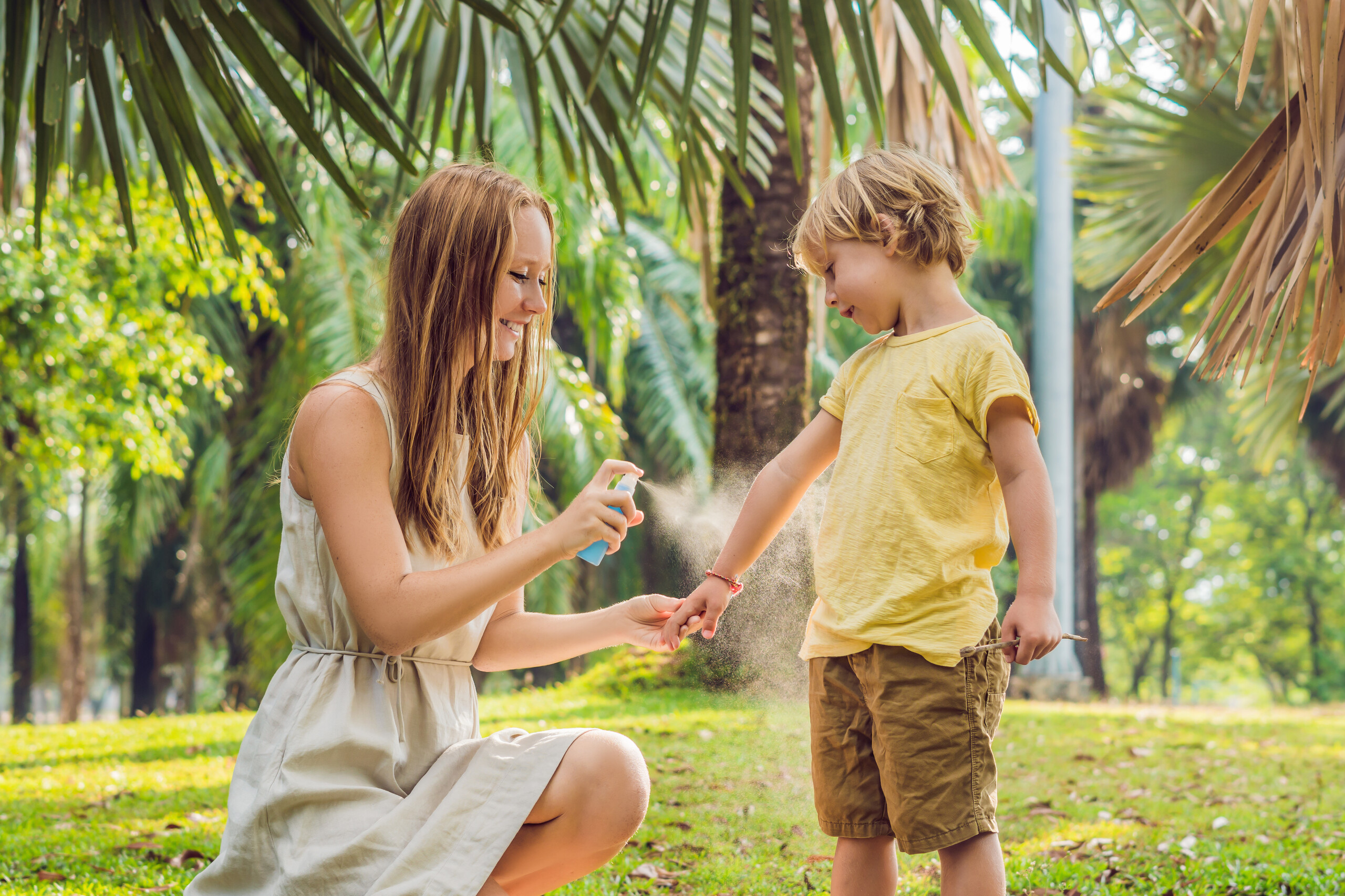 repellents_outside_mom_sprays_son